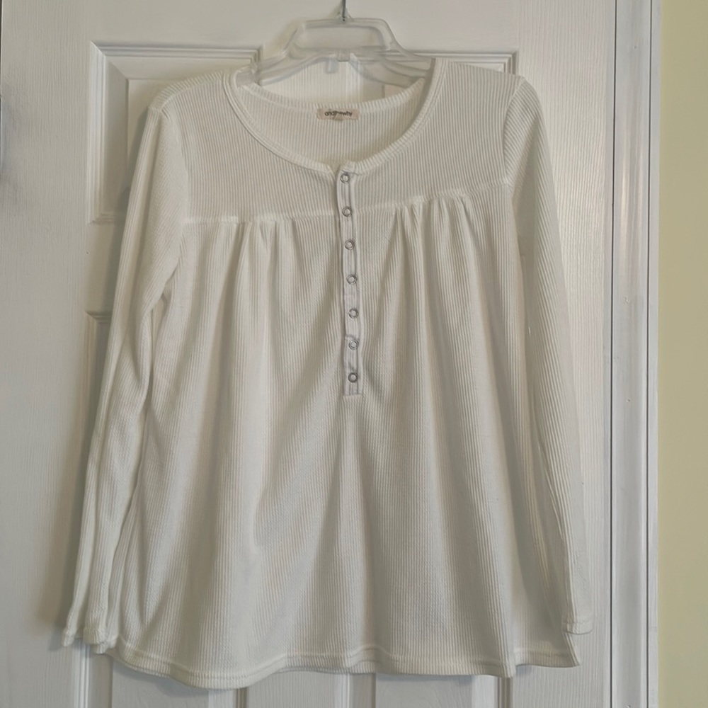 Andthewhy cream colored long sleeve top. Size medium.